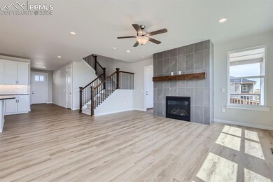 Unfurnished living room with a wealth of natural l