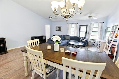 Dining room featuring light wood-style flooring, c