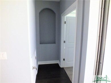 Wall niche detail at entry to master bedroom