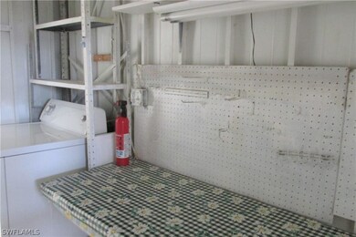 Laundry/utility from doorway to rear lanai.