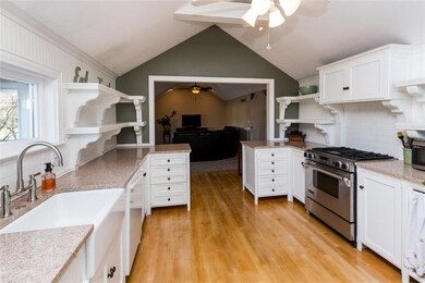 POTTERY BARN-STYLE KITCHEN OPENS INTO LIVING ROOM