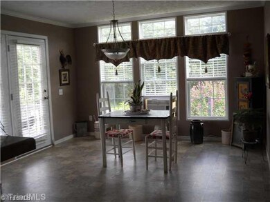 Dining Room. Huge dining area with great view of yard and access to patio