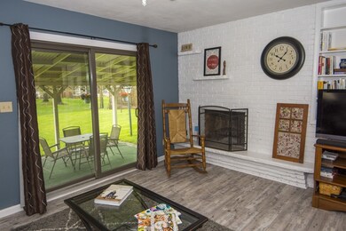 Wood burning fireplace for cooler weather.  Slider