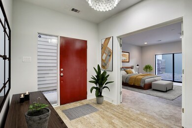 A crystalline fixture anchors the space, complimen