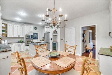 Chef's Kitchen with Eat-In Dining, and entry from 