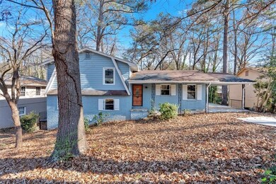 View of front of home featuring covered porch and 