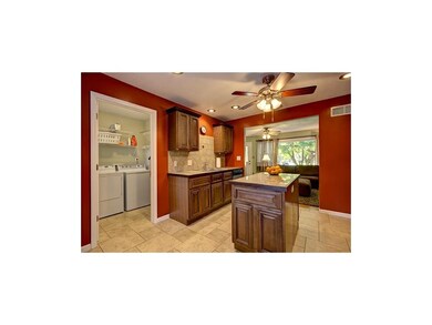 Laundry conveniently located off kitchen.