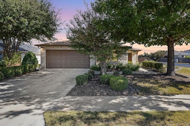 View of property hidden behind natural elements f