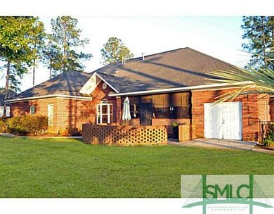 Exterior Back. This home has a screened porch and 