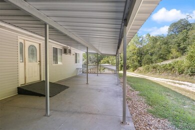 Covered outside entrance to top floor