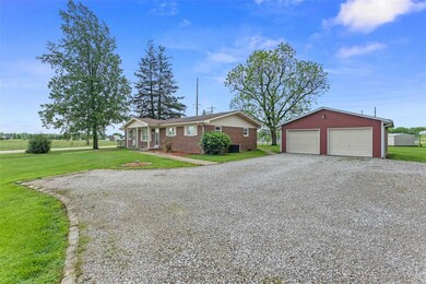 Exceptionally well maintained 1 story brick ranch on .73 acres with oversized detached 2 car garage.