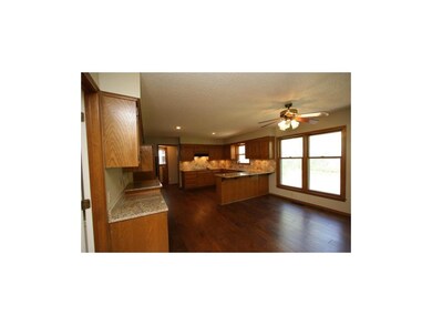 Updated kitchen w/granite tops, travertine backspl