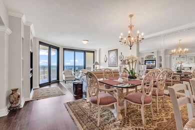 Dining area featuring a textured ceiling, expansiv