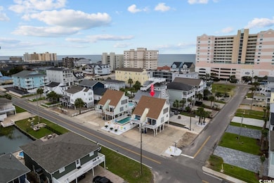 View of urban area featuring a nearby body of water