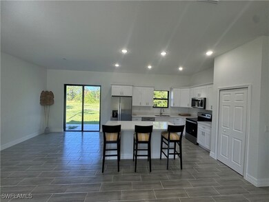 Kitchen featuring stainless steel appliances, a ce