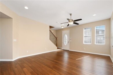 Entryway with custom half open staircase.