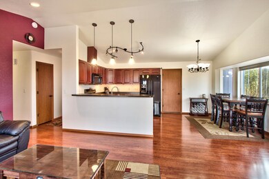 Main living area, kitchen and dining