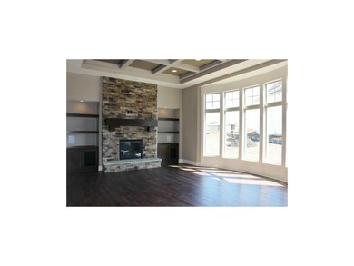 Stunning stone floor to ceiling fireplace,decorati