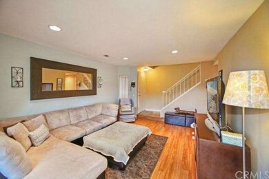 View of living room toward stairs.