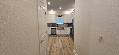 Hallway Living to Kitchen/Dining