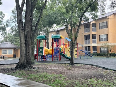 7606 Pissarro Dr unit 105, Orlando, FL 32819 - photo 2