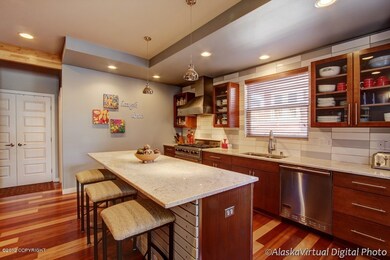 Galley Kitchen w/Slab Granite Counters