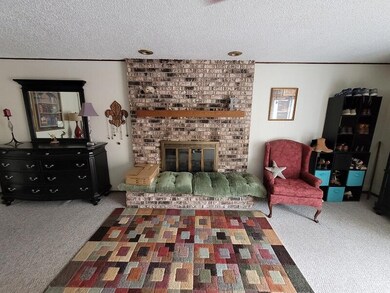 Fireplace in Rec Room just off the pool