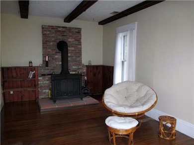 Living Room Formal living room has wood burning st