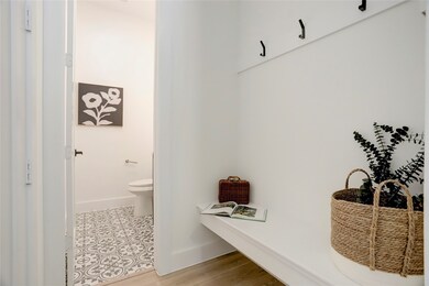There is a half bath on the 1st floor adjacent to