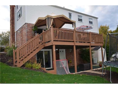 Exterior Back. Large deck complete with portable g