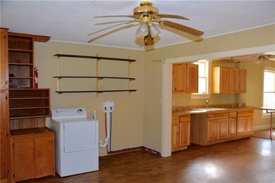 Washer dryer just off kitchen and bedroom