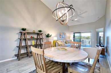 Dining area with light wood-type flooring, ceiling
