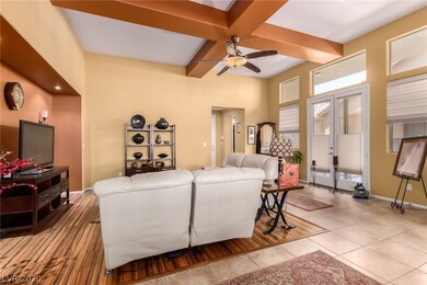 French doors off of living room to side patio