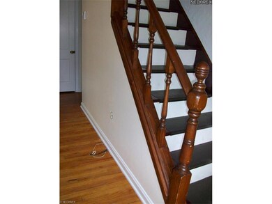 Stairway to the second floor which has two bedroom