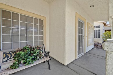 Covered front porch with solar screens