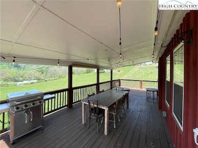 Large covered porches on both sides of the home.
