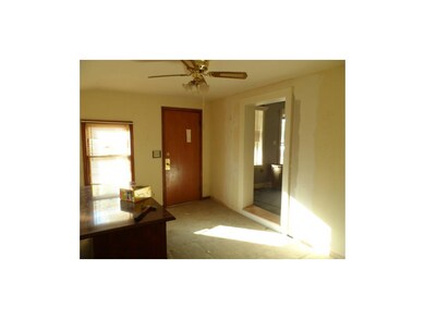This could be a 3rd bedroom with addition of a clo