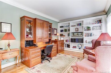 Office with Built-Ins and Double French Doors