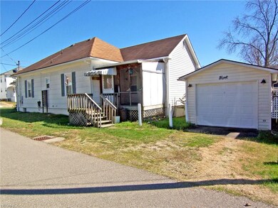 Detached single garage with remote just steps from