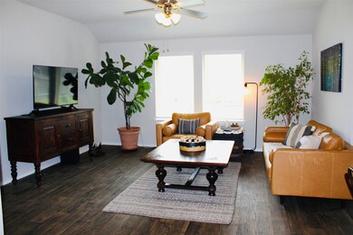 So much natural light with these large windows in the living area