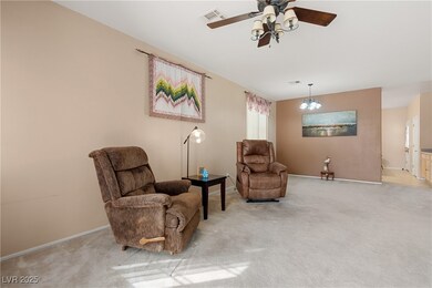 Sitting room featuring carpet floors, visible vent