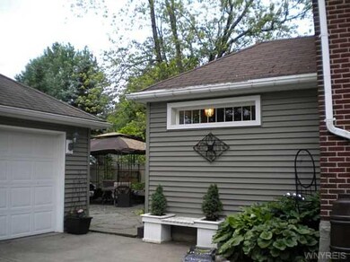 Exterior Back. Back addition features large foyer 