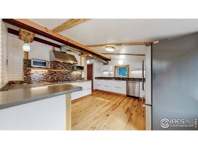 Modern kitchen with quartz counters and tile backspash