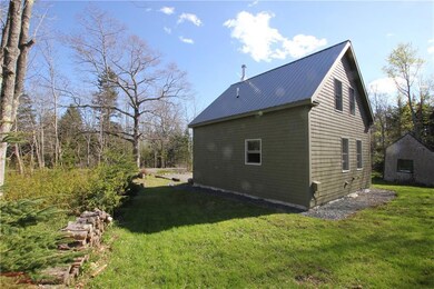 Side and Back of House Looking...