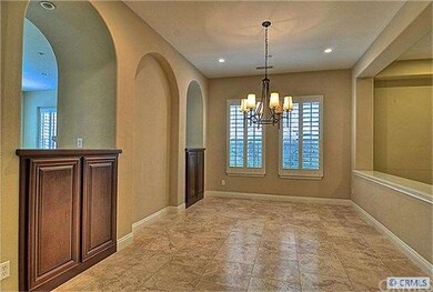 Entry & formal dining room great you with Traverti