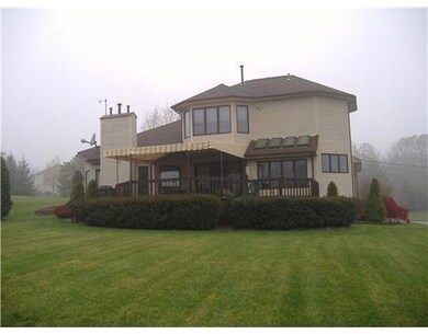 Exterior Back. Custom Awning. Built in Gas Grill O