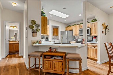 Kitchen with appliances with stainless steel finis