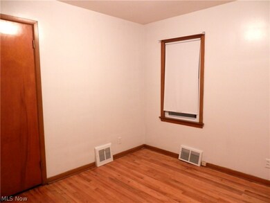First floor bedroom with hardwood

