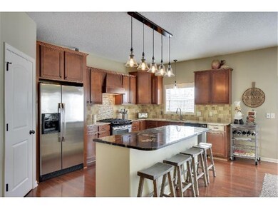 A detailed Kitchen shot shows the large center isl