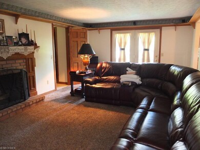 Family room with fireplace.